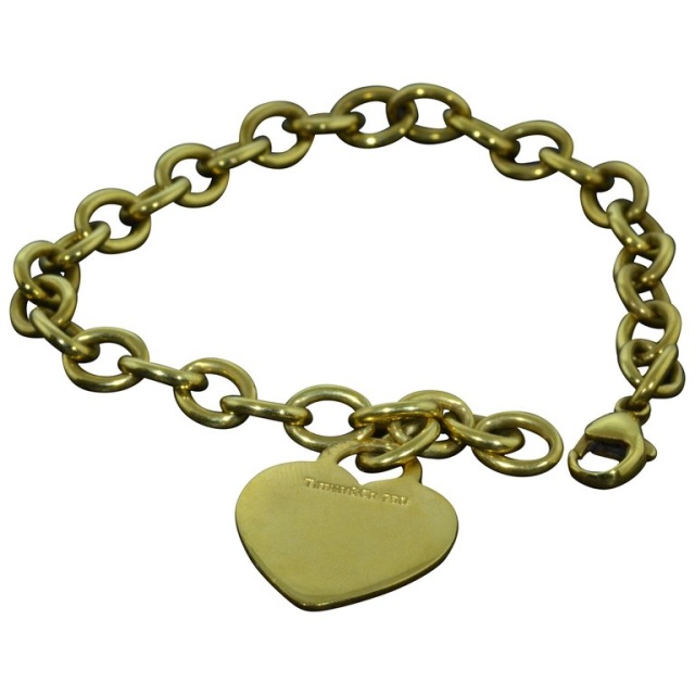 SOLD: The Lyndsay: Tiffany & Co. 18 Karat Yellow Gold Charm Bracelet ...